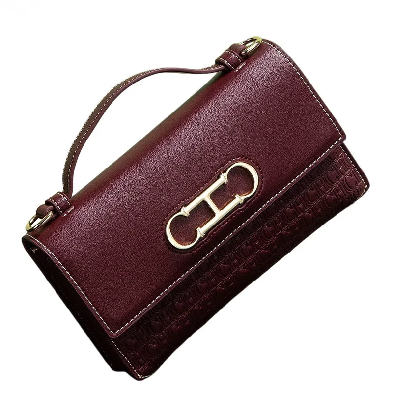 Montierra Luxe — bolso elegante en cuero con diseño compacto y acabado sofisticado.
