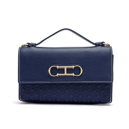 Montierra Luxe — bolso elegante en cuero con diseño compacto y acabado sofisticado.