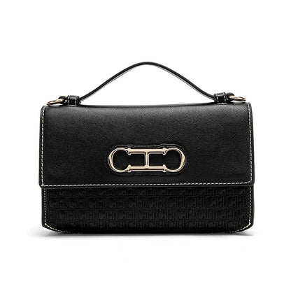 Montierra Luxe — bolso elegante en cuero con diseño compacto y acabado sofisticado.