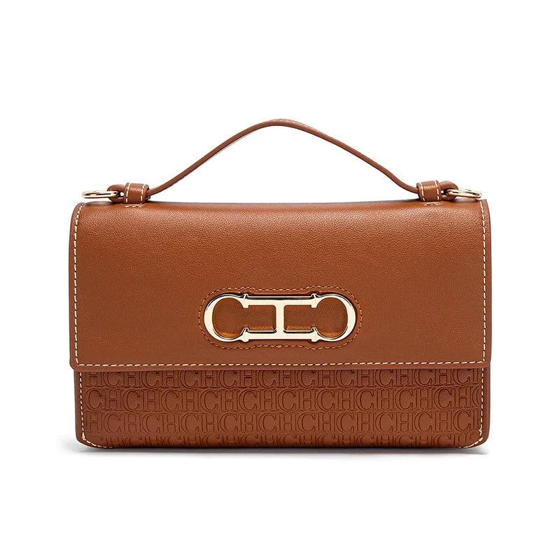 Montierra Luxe — bolso elegante en cuero con diseño compacto y acabado sofisticado.